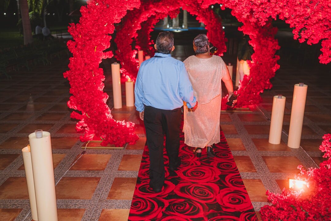 Celebrity couple posing together on a red carpet